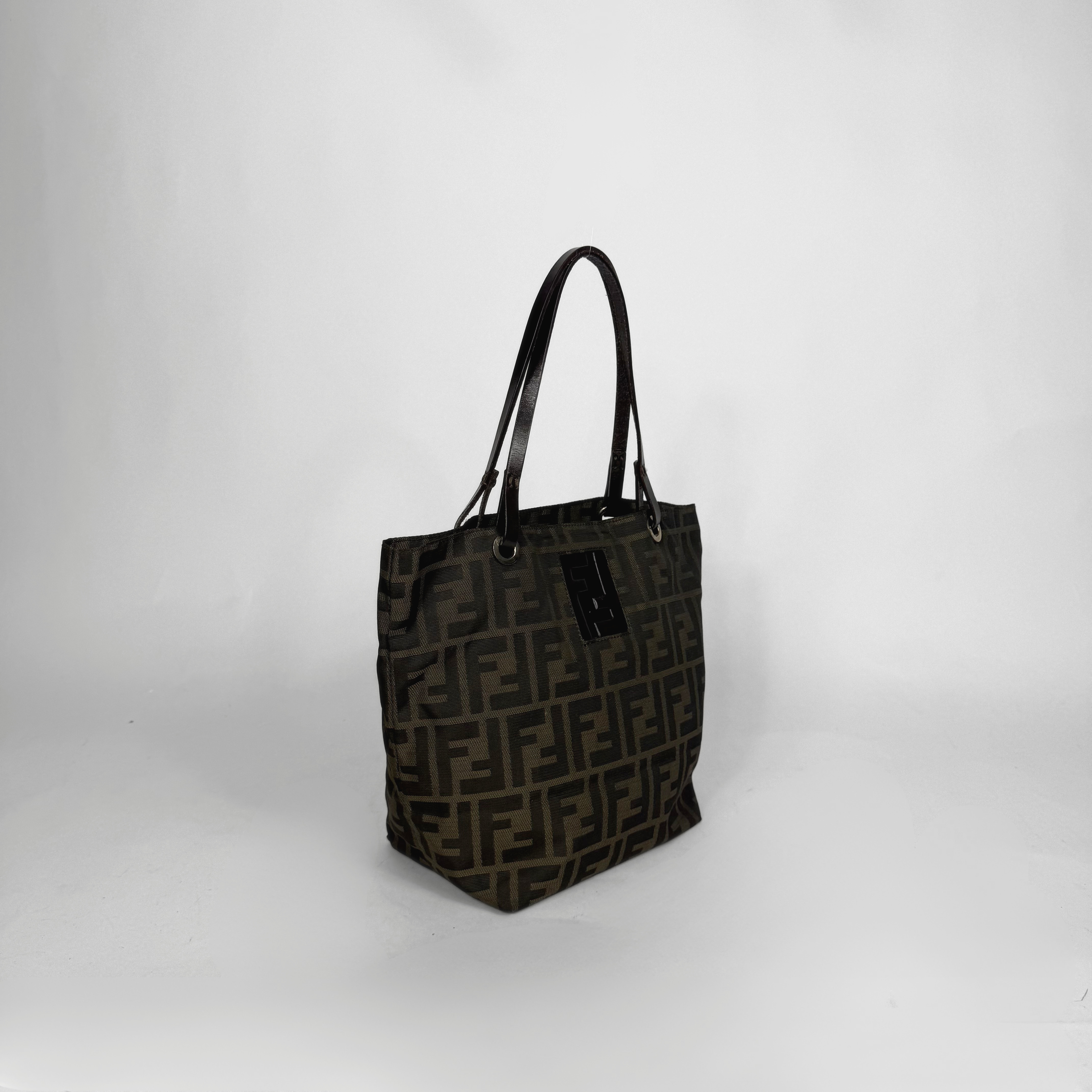 Black patterned tote bag on a white background